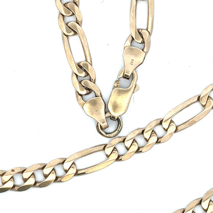 9ct yellow gold Figaro chain with a polished finish, weighing 24.8g, showcasing its intricate linked design.