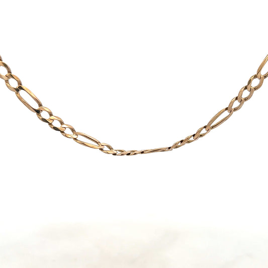 9ct yellow gold figaro chain weighing 25.9g, featuring classic interlinked design, unbranded jewelry accessory.
