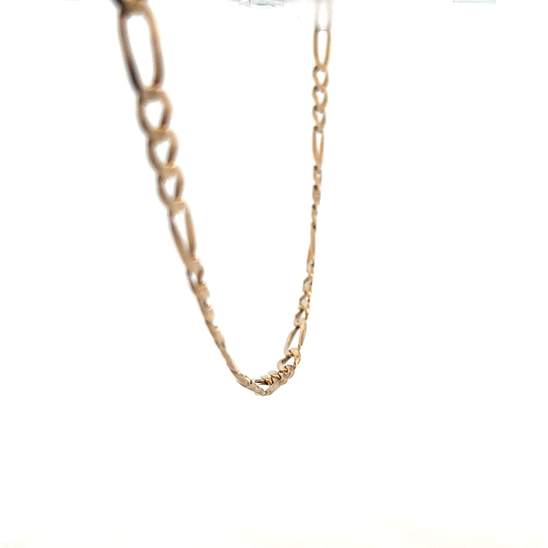 9ct yellow gold figaro chain weighing 25.9g, unbranded jewelry with intricate linked design, shiny and polished finish.