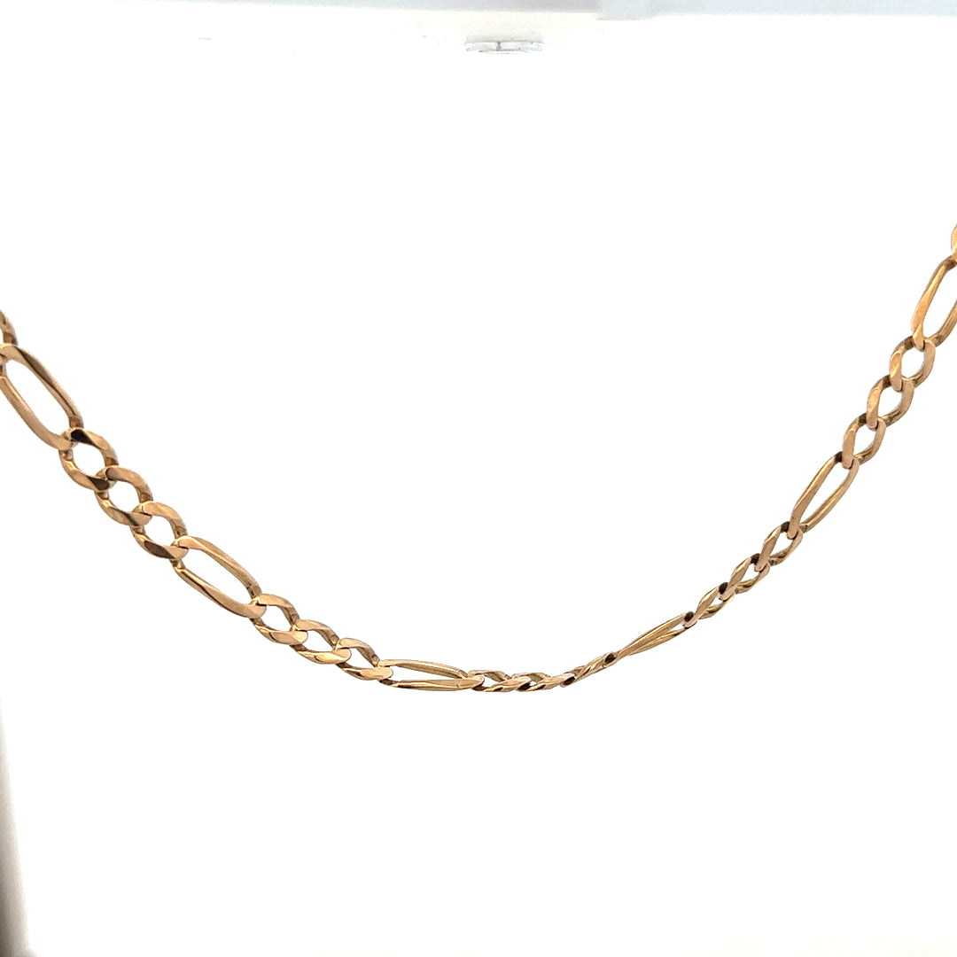 9ct yellow gold figaro chain weighing 25.9g, with intricate linked design and polished finish, displayed against a neutral background.