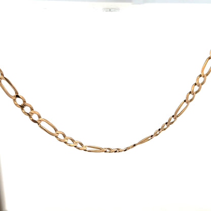 9ct yellow gold figaro chain weighing 25.9g, with intricate linked design and polished finish, displayed against a neutral background.