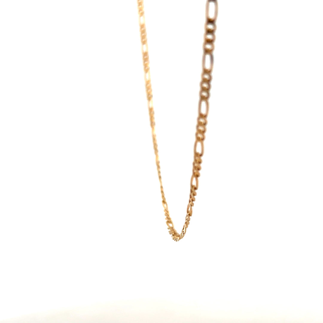 9ct yellow gold Figaro chain weighing 3.7g, unbranded, with interlinked flat and twisted links, displayed on a white background.