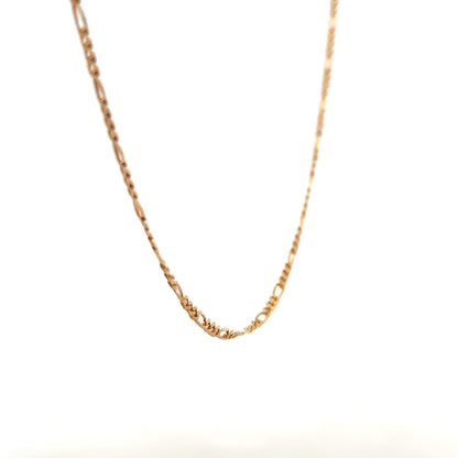 9ct yellow gold figaro chain weighing 3.7g, unbranded, with detailed links shown in the image.