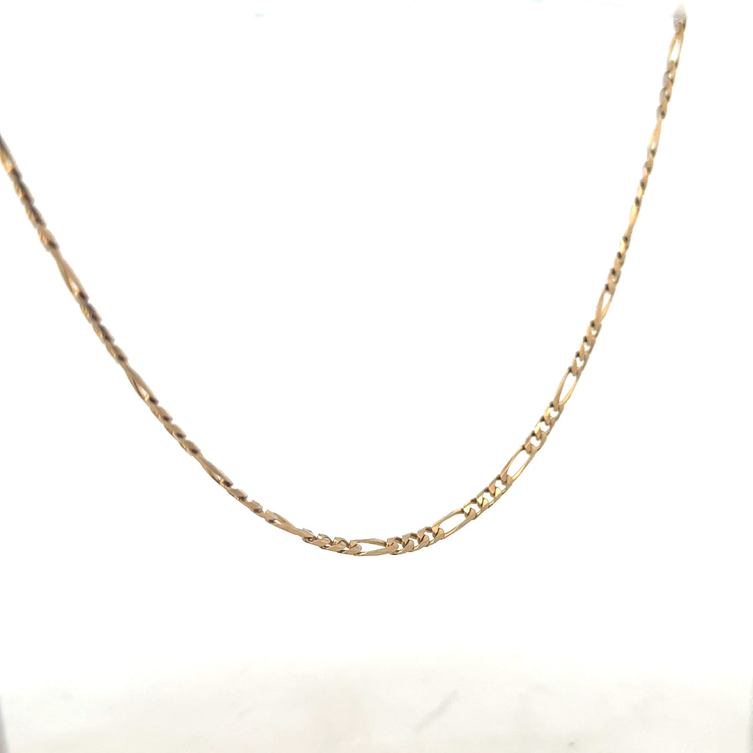9ct yellow gold Figaro chain, unbranded, with a weight of 7.2g, showing the classic linked design on a plain background.