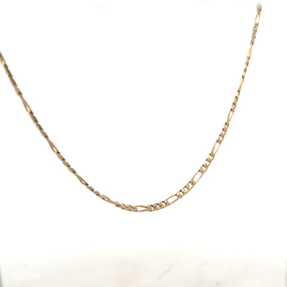 9ct yellow gold Figaro chain, unbranded, with a weight of 7.2g, showing the classic linked design on a plain background.