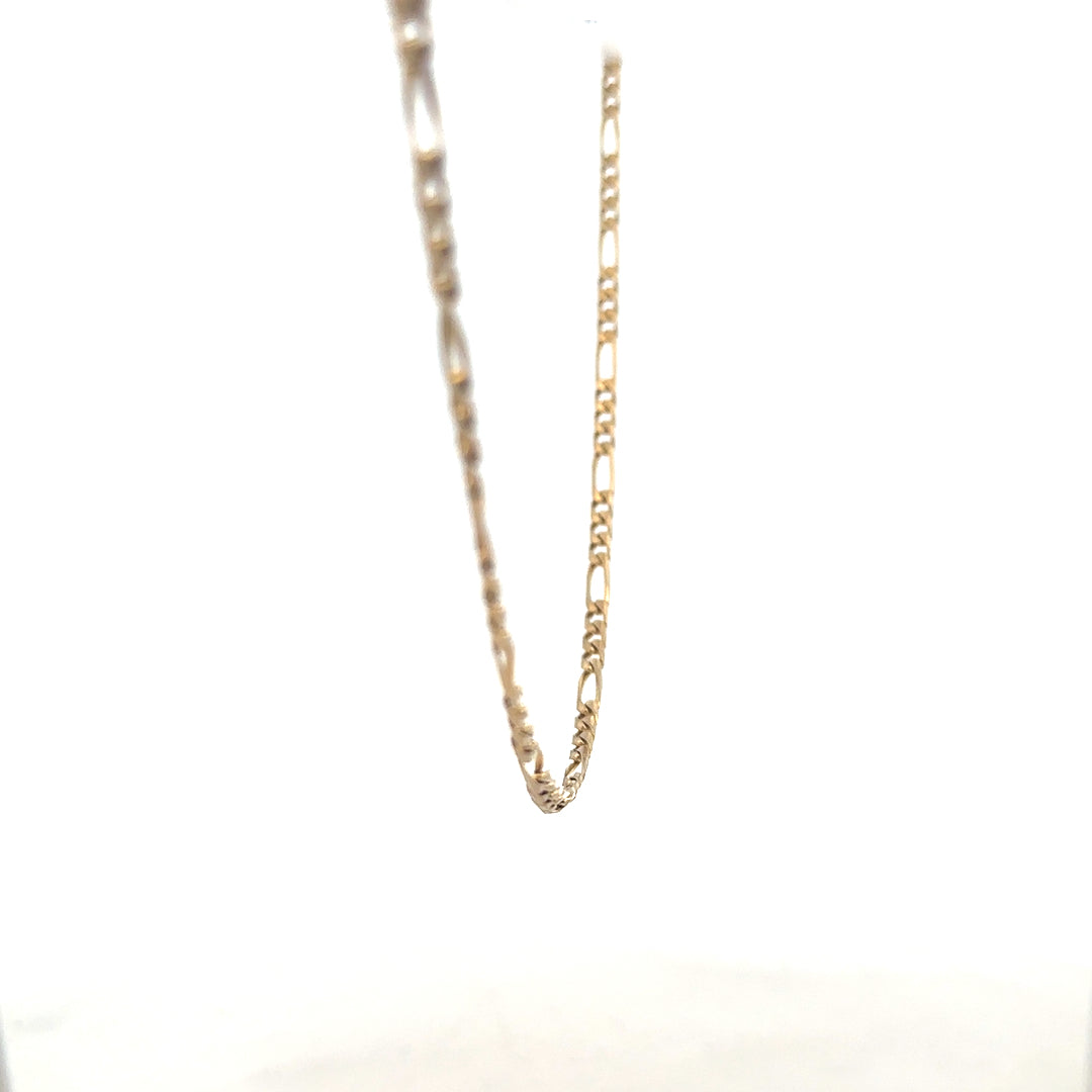 9ct yellow gold Figaro chain weighing 7.2g, featuring interlinked oval links, unbranded jewelry accessory.