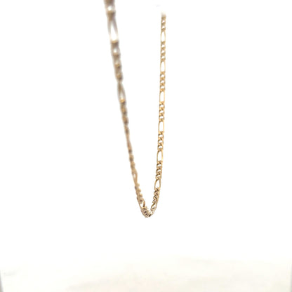 9ct yellow gold Figaro chain weighing 7.2g, featuring interlinked oval links, unbranded jewelry accessory.