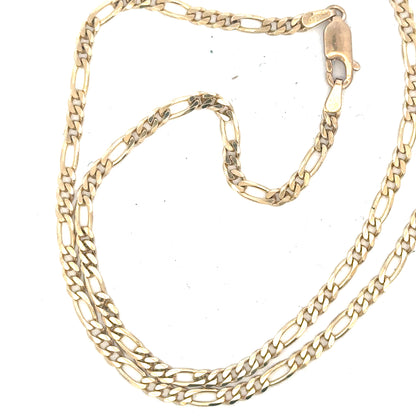 9ct yellow gold figaro chain weighing 9.2g, featuring interlinked flat and rounded links, displayed on a plain background.