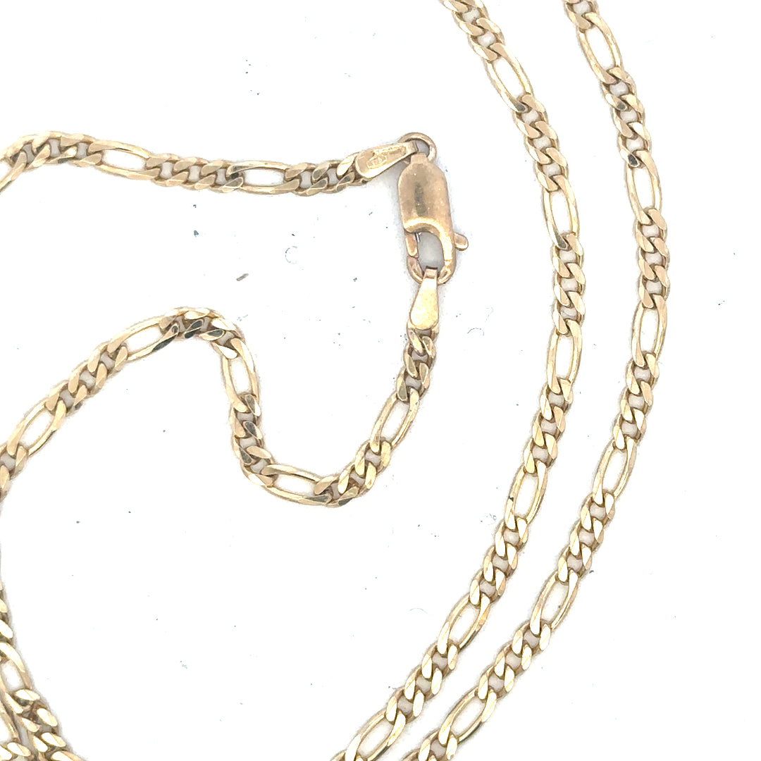 9ct yellow gold Figaro chain weighing 9.2g, showcasing its intricate linked design and shiny finish.