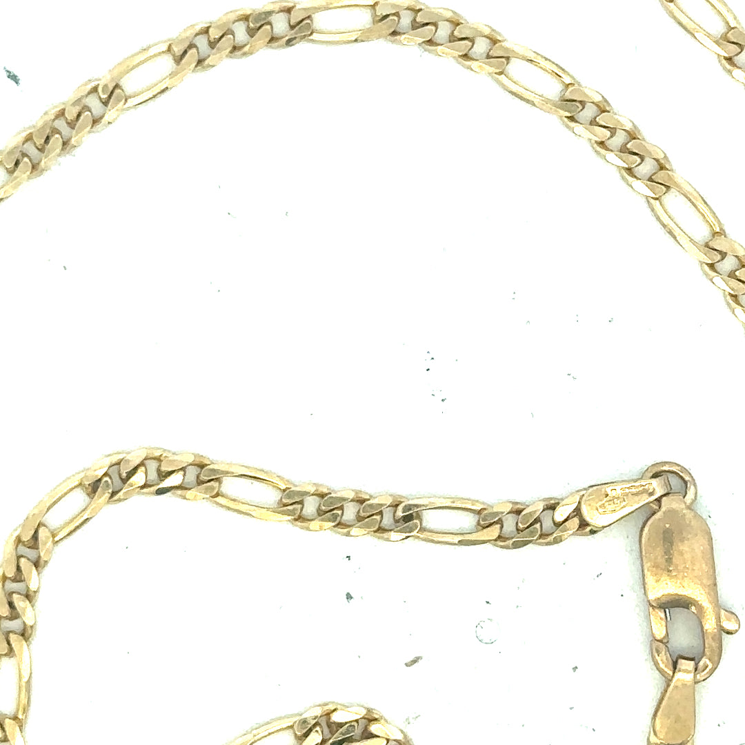 9ct yellow gold figaro chain weighing 9.2g, featuring interlinked flat oval links, unbranded jewelry accessory.