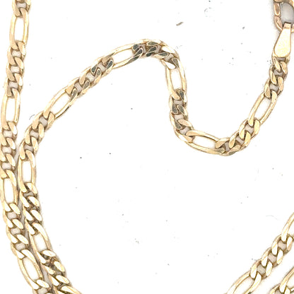 9ct yellow gold figaro chain weighing 9.2g, featuring a classic interlinked design and polished finish, unbranded jewelry accessory.