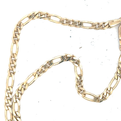 9ct yellow gold figaro chain weighing 9.2g, displayed with detailed links, unbranded jewelry accessory.