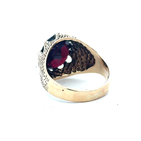 9ct yellow gold garnet ring in size N1/2, featuring a vibrant gemstone set in a simple gold band.