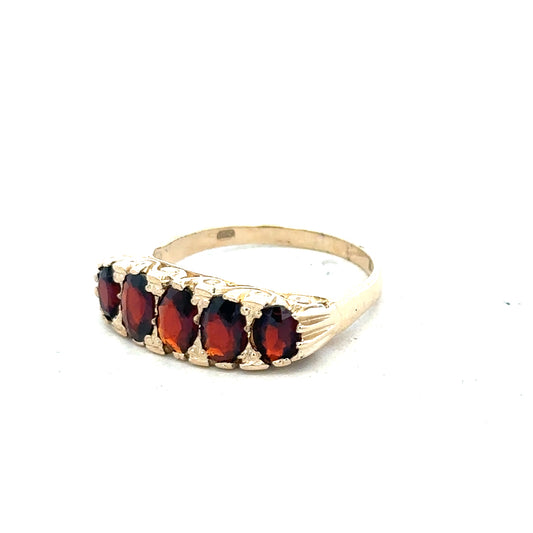 9ct yellow gold garnet ring in size S, featuring a vibrant garnet gemstone set in a classic gold band.