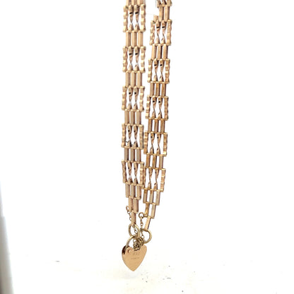 9ct yellow gold gate bracelet weighing 5.8g, unbranded, with interlocking chain links, displayed on a neutral background.