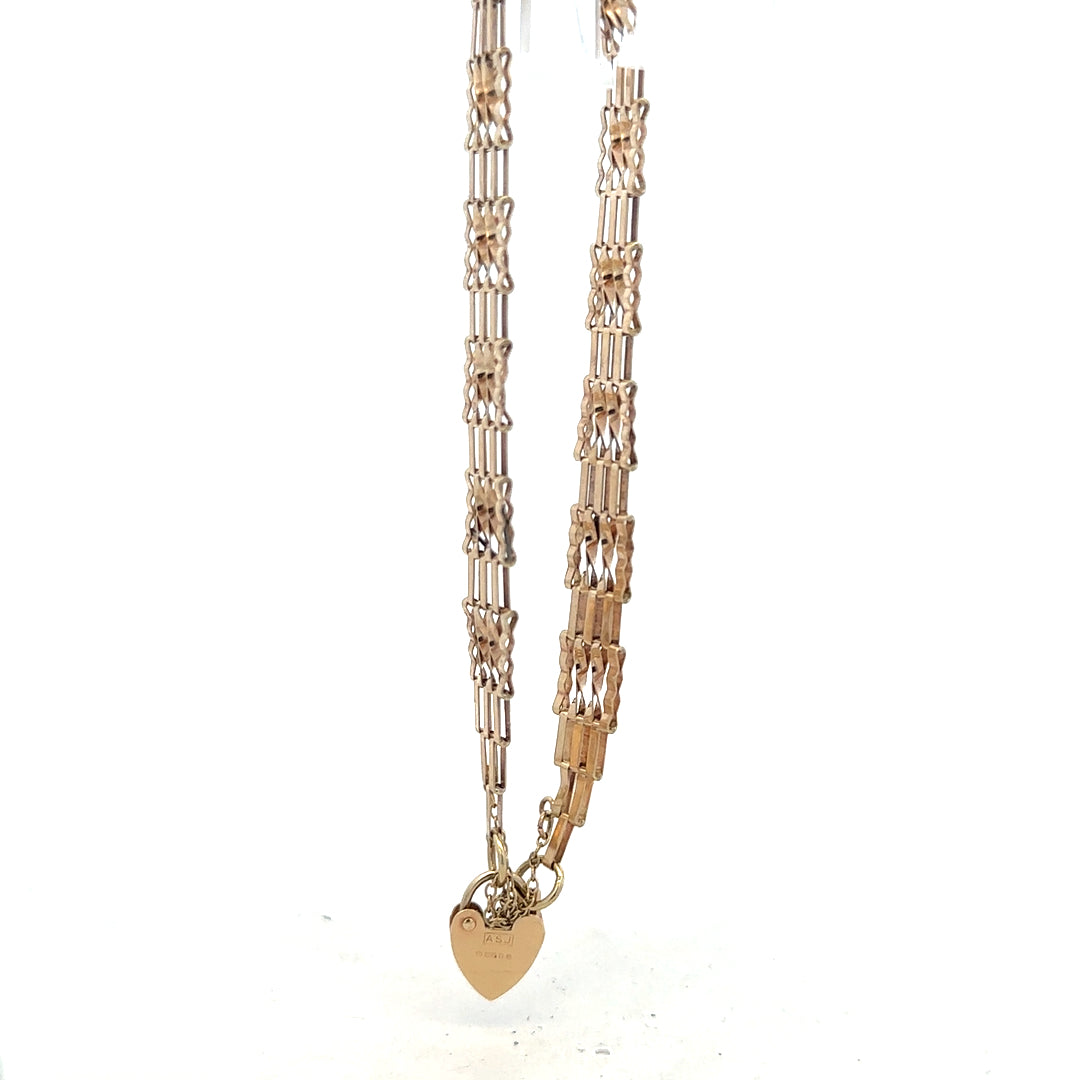 9ct yellow gold gate bracelet weighing 5.8g, featuring a classic link design, unbranded jewelry accessory.