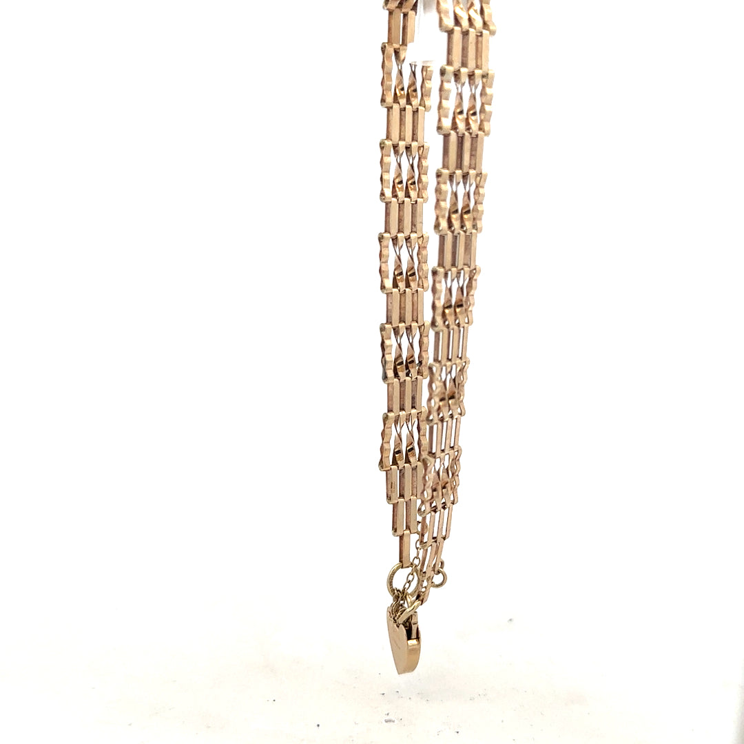 9ct yellow gold gate bracelet weighing 5.8g, featuring a classic chain design with secure clasp, unbranded jewelry accessory