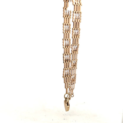 9ct yellow gold gate bracelet weighing 5.8g, featuring a classic chain design with secure clasp, unbranded jewelry accessory
