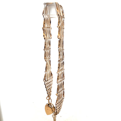 9ct yellow gold gate bracelet weighing 7.4g, unbranded, with a classic chain link design, shown in the product image.