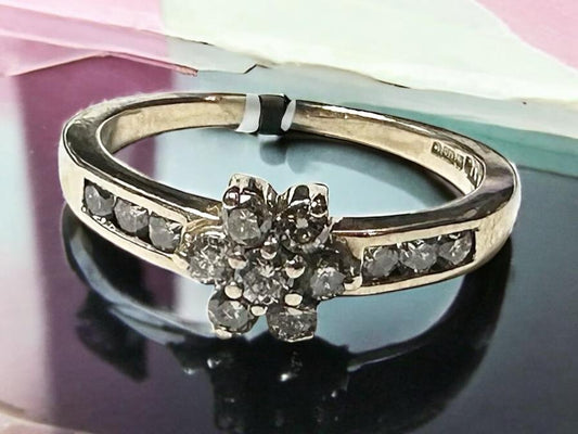 9ct yellow gold half-caret diamond ring in size M, featuring a sparkling diamond and elegant gold band.
