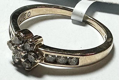 9ct yellow gold half-caret diamond ring in size M, featuring a sparkling diamond setting and elegant band design.