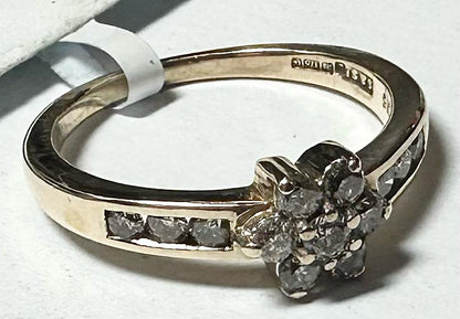 9ct yellow gold half-carat diamond ring in size M, showcasing a sparkling diamond set on a gold band.