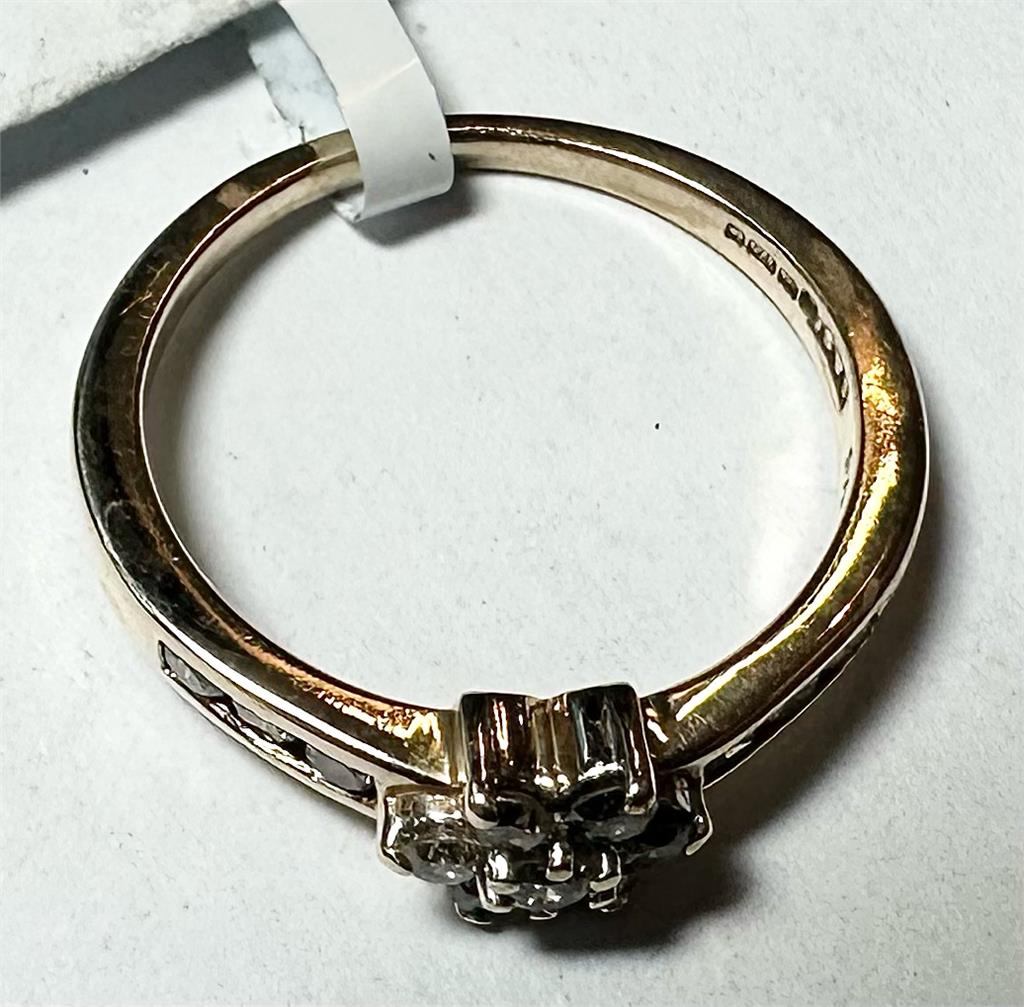 9ct yellow gold half-carat diamond ring in size M, featuring a shimmering diamond set in a classic band.