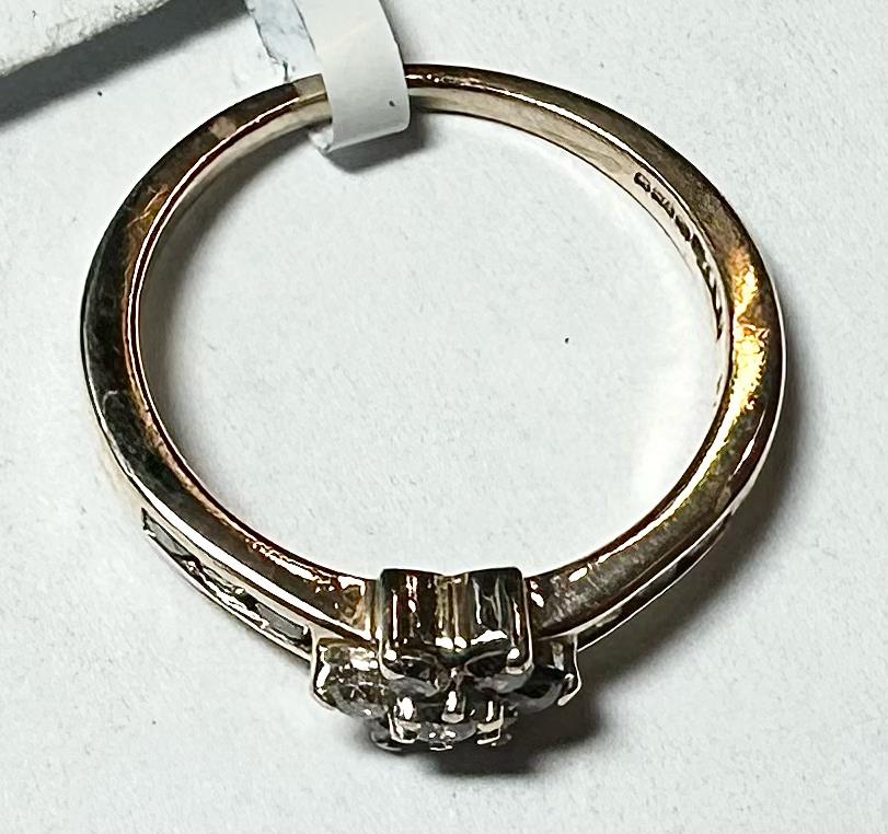 9ct yellow gold half-carat diamond ring in size M, featuring a sparkling diamond design, unbranded jewelry.