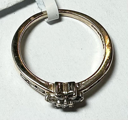 9ct yellow gold half-carat diamond ring in size M, featuring a sparkling diamond design, unbranded jewelry.