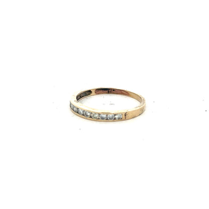 9ct yellow gold half eternity diamond ring in size N with sparkling diamonds, featuring a sleek and elegant design.