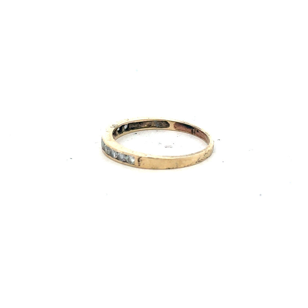 9ct yellow gold half eternity diamond ring, size N, featuring a row of sparkling diamonds around the band.