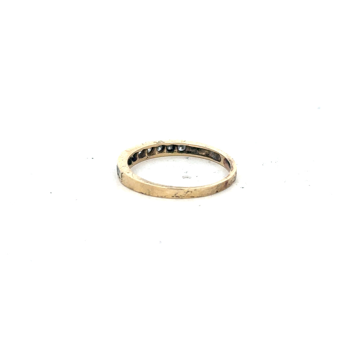 9ct yellow gold half eternity diamond ring in size N, featuring a row of sparkling diamonds on a sleek band.