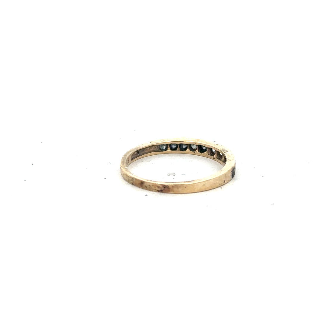 9ct yellow gold half eternity diamond ring in size N, featuring a row of sparkling diamonds on a sleek gold band.