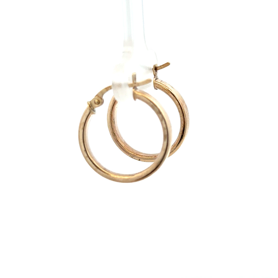 9ct yellow gold hoop earrings, lightweight 1.1g, classic round design, unbranded jewelry accessory with a polished finish.
