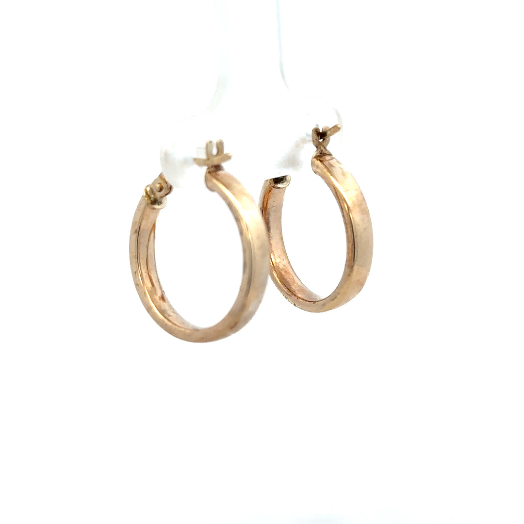 9ct yellow gold hoop earrings, lightweight 1.1g, with a classic circular design, perfect for everyday wear.