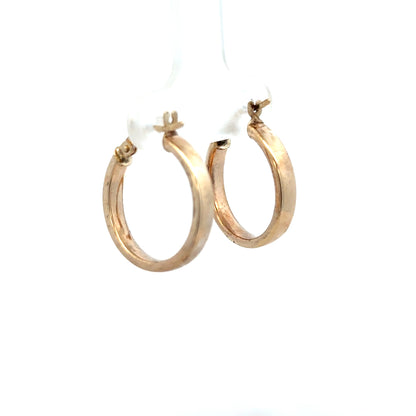9ct yellow gold hoop earrings, lightweight 1.1g, with a classic circular design, perfect for everyday wear.