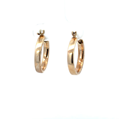 9ct yellow gold hoop earrings, lightweight 1.1g, with a classic circular design, perfect for everyday wear and elegant style.