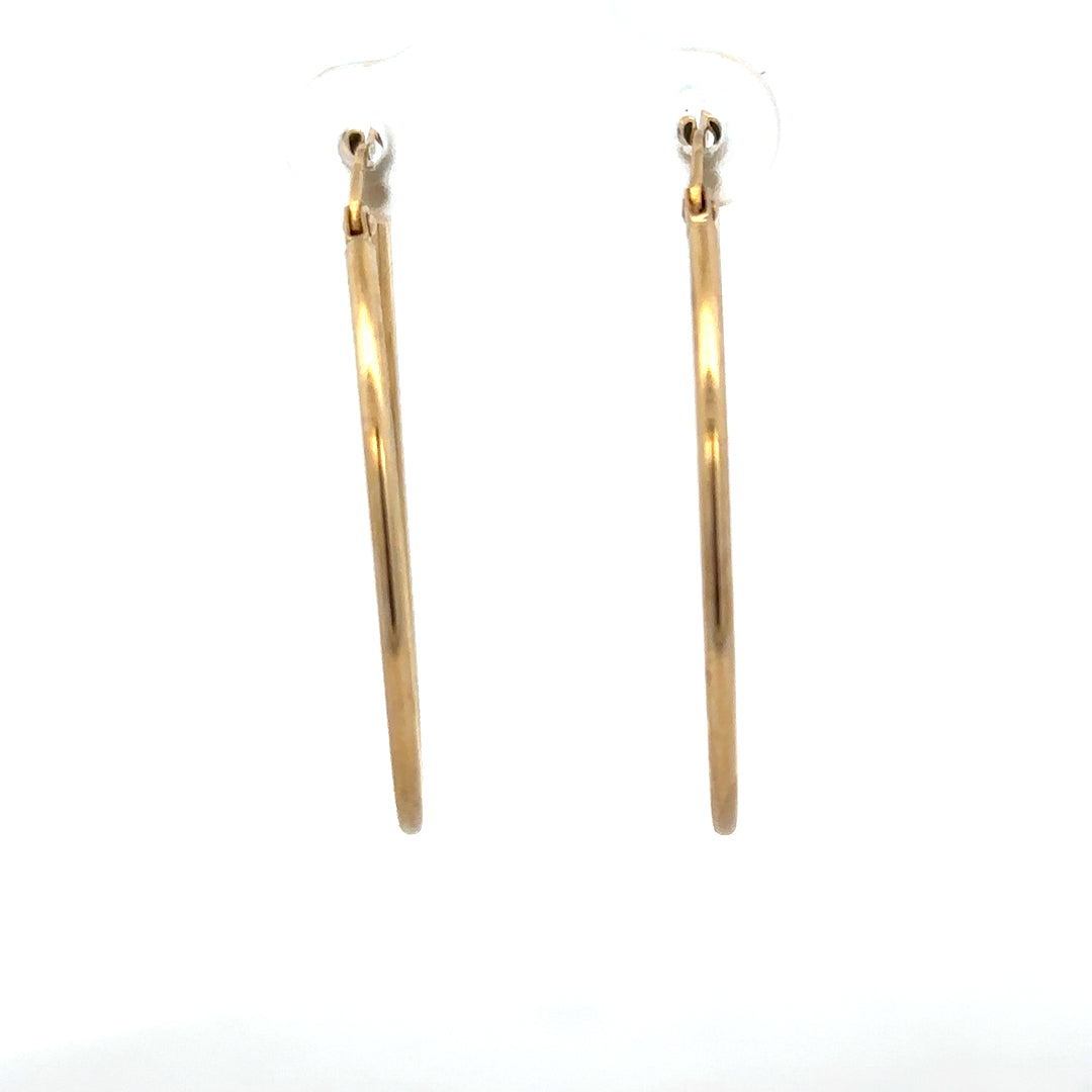 9ct yellow gold hoop earrings weighing 1.1g, unbranded, with a classic circular design and polished finish