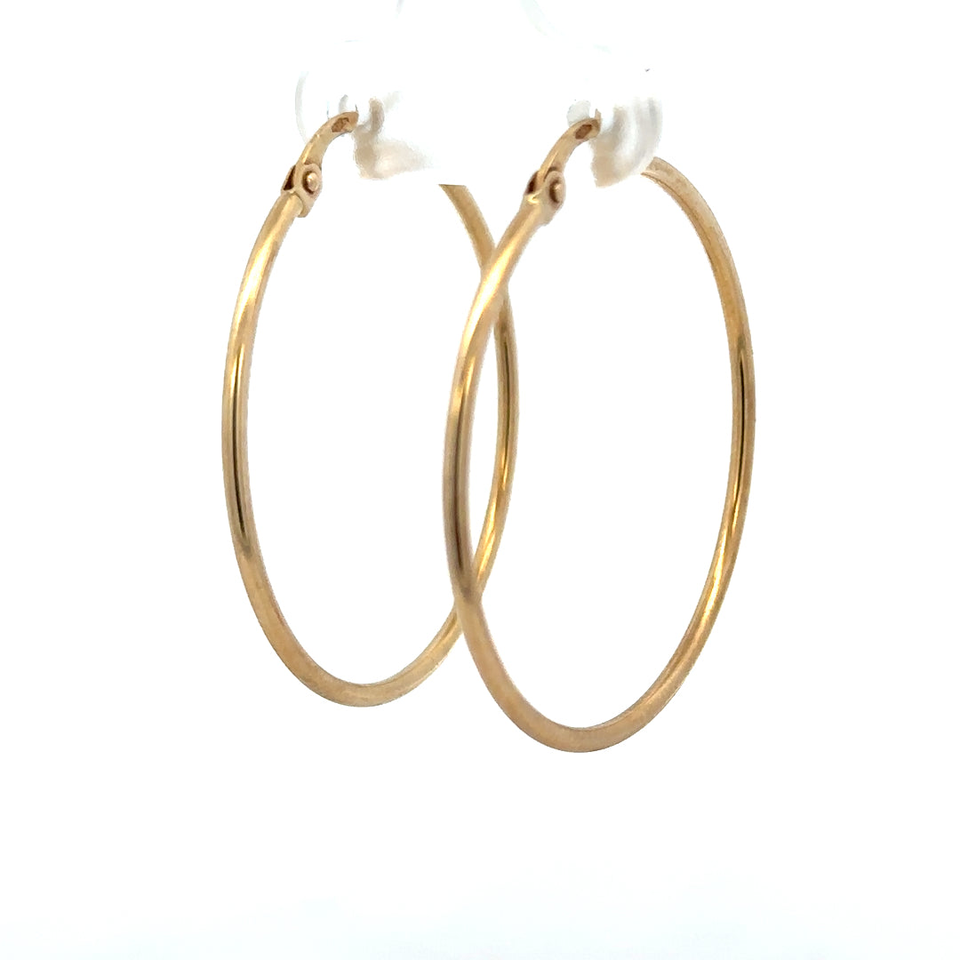 9ct yellow gold hoop earrings weighing 1.1g, unbranded, with a classic circular design and polished finish.