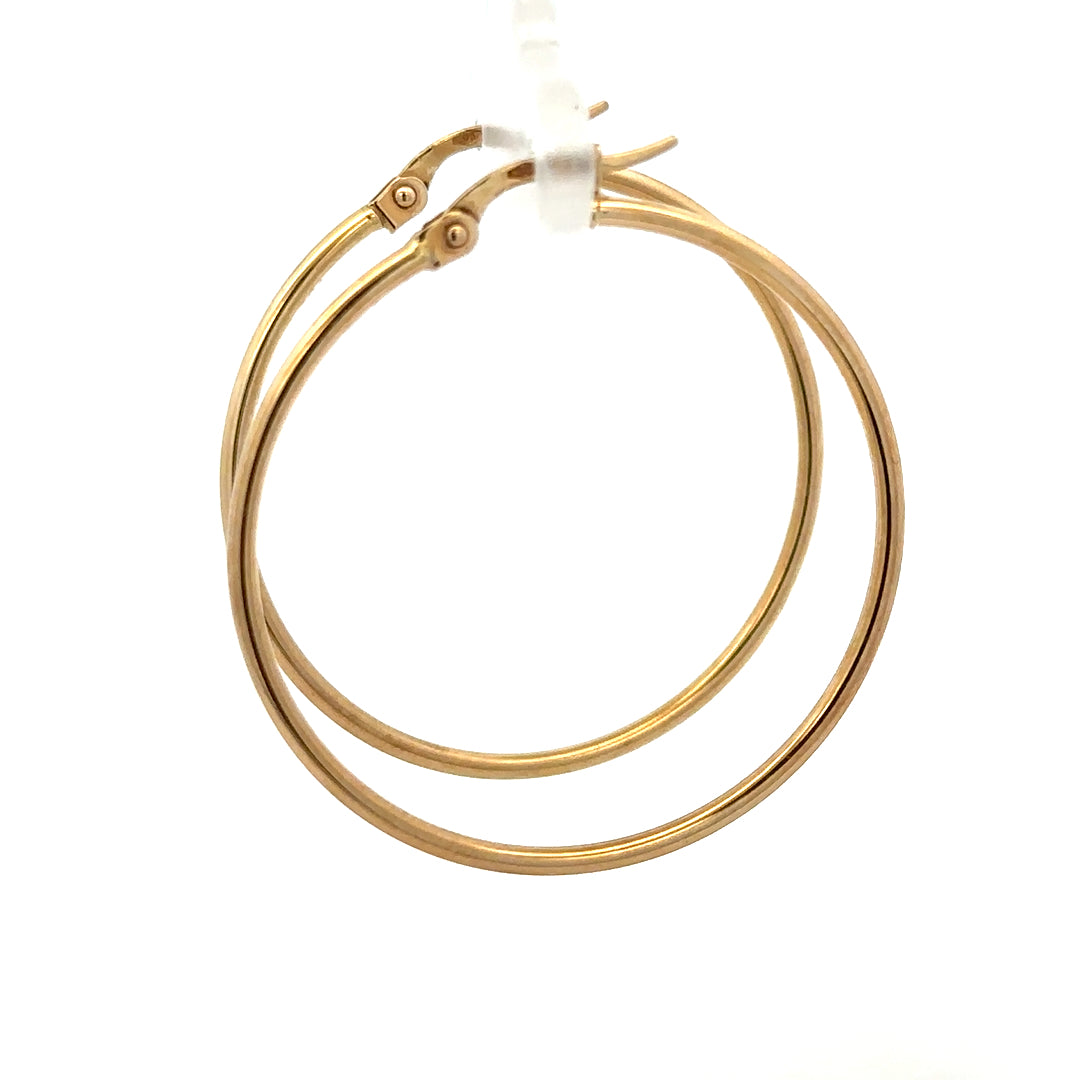 9ct yellow gold hoop earrings with a sleek, classic design weighing 1.1g, perfect for elegant everyday wear.