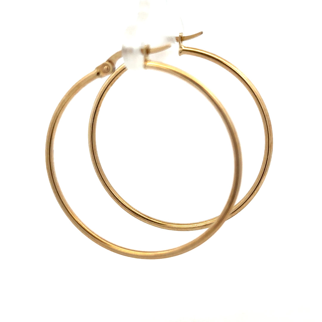 9ct yellow gold hoop earrings, lightweight 1.1g, with a classic circular design, shown in a close-up image.
