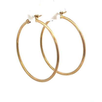 9ct yellow gold hoop earrings with 1.1g weight, showcasing a classic circular design and polished finish.