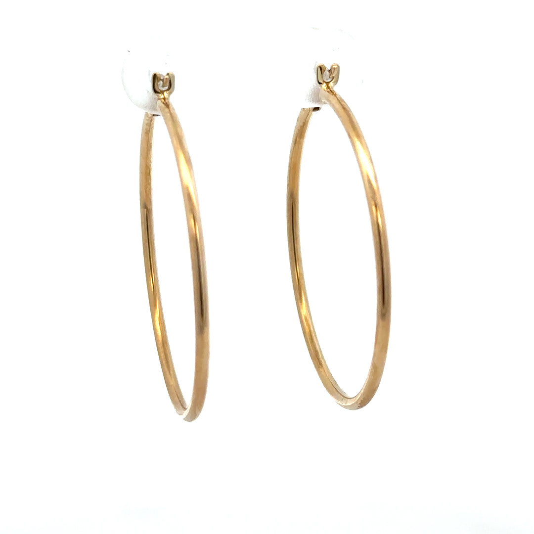 9ct yellow gold hoop earrings, lightweight 1.1g, classic round design, unbranded jewelry accessory with shiny finish.