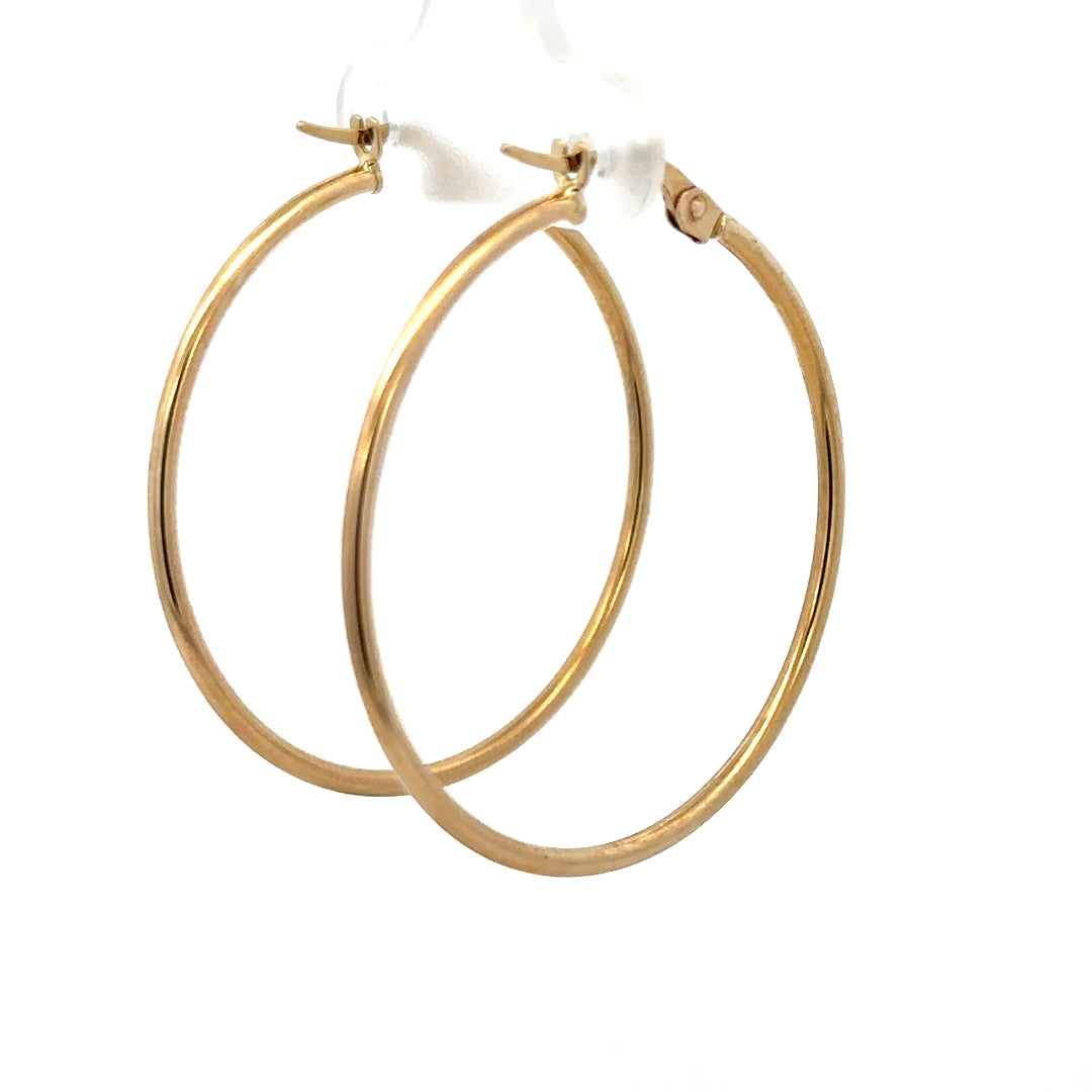 9ct yellow gold hoop earrings weighing 1.1g, unbranded, with a classic circular design and polished finish.