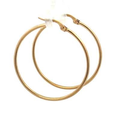 9ct yellow gold hoop earrings weighing 1.1g, featuring a classic round design and polished finish, unbranded jewelry.