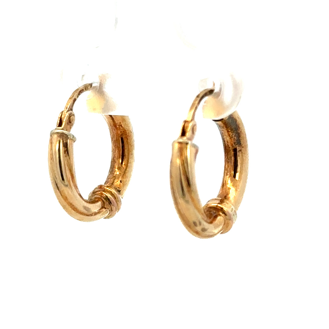 9ct yellow gold hoop earrings with a 1.5g weight, featuring a classic round design, perfect for everyday wear.