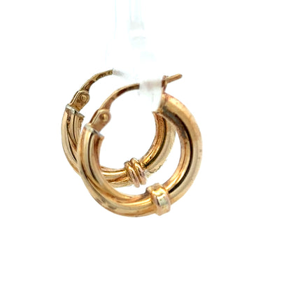 9ct yellow gold hoop earrings weighing 1.5g, unbranded, featuring classic circular design with a polished finish.
