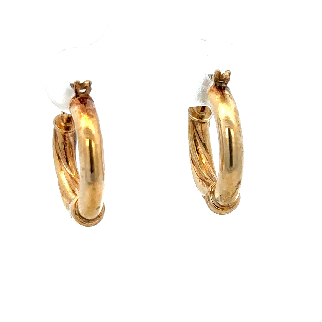 9ct yellow gold hoop earrings with a 1.5g weight, featuring a classic circular design and polished finish.