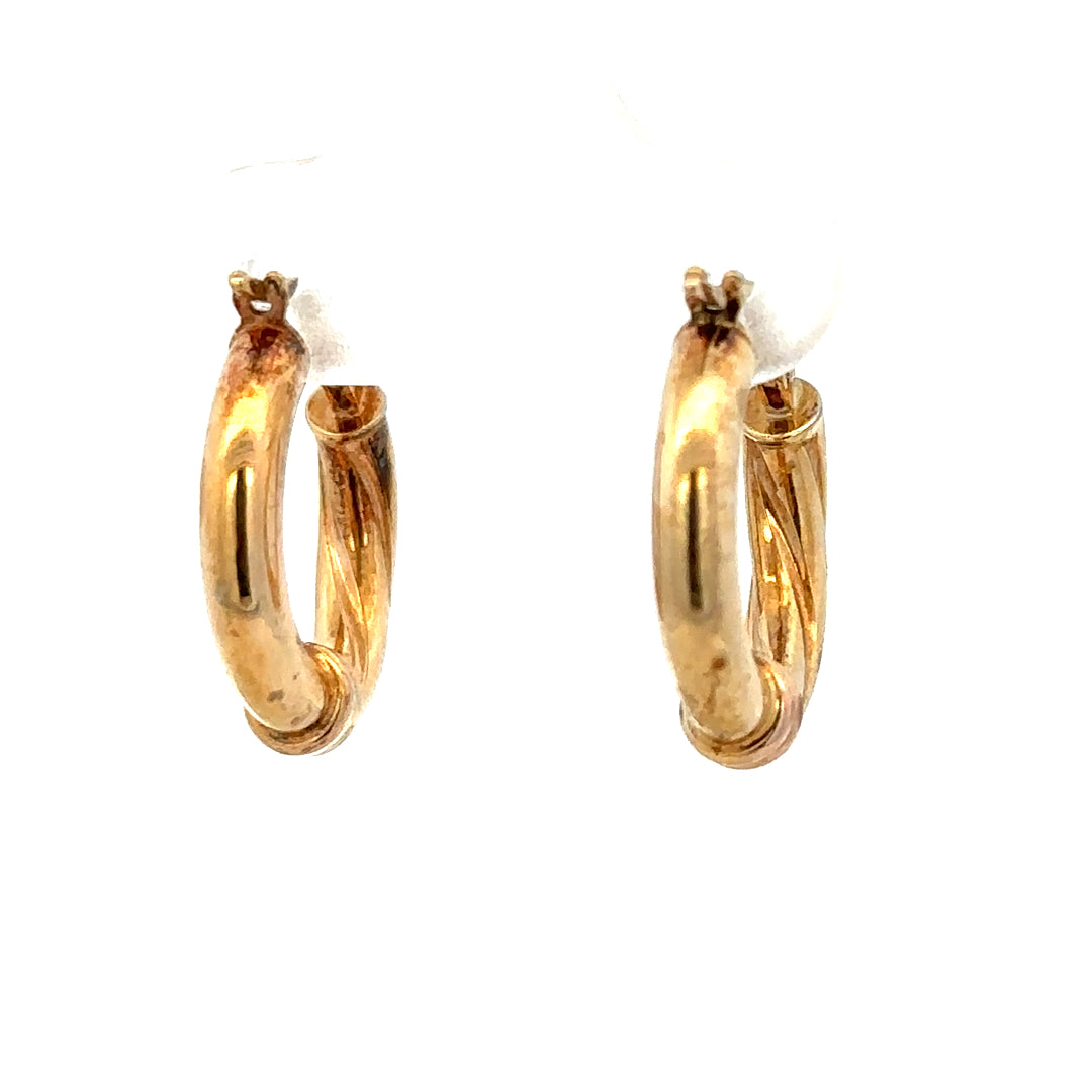 9ct yellow gold hoop earrings with a 1.5g weight, featuring classic round design and secure clasp closure.