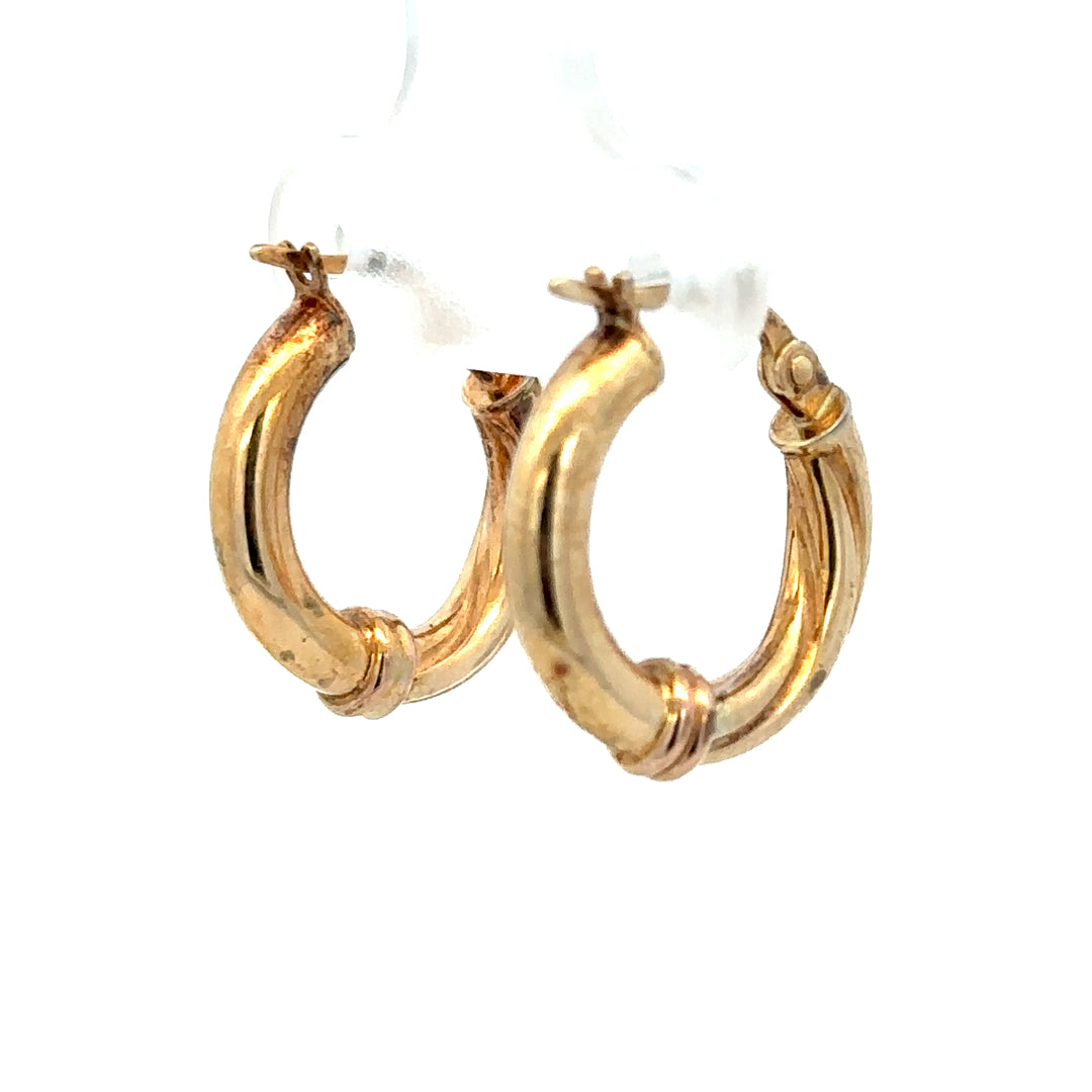 9ct yellow gold hoop earrings weighing 1.5g, unbranded, featuring classic circular design with polished finish.
